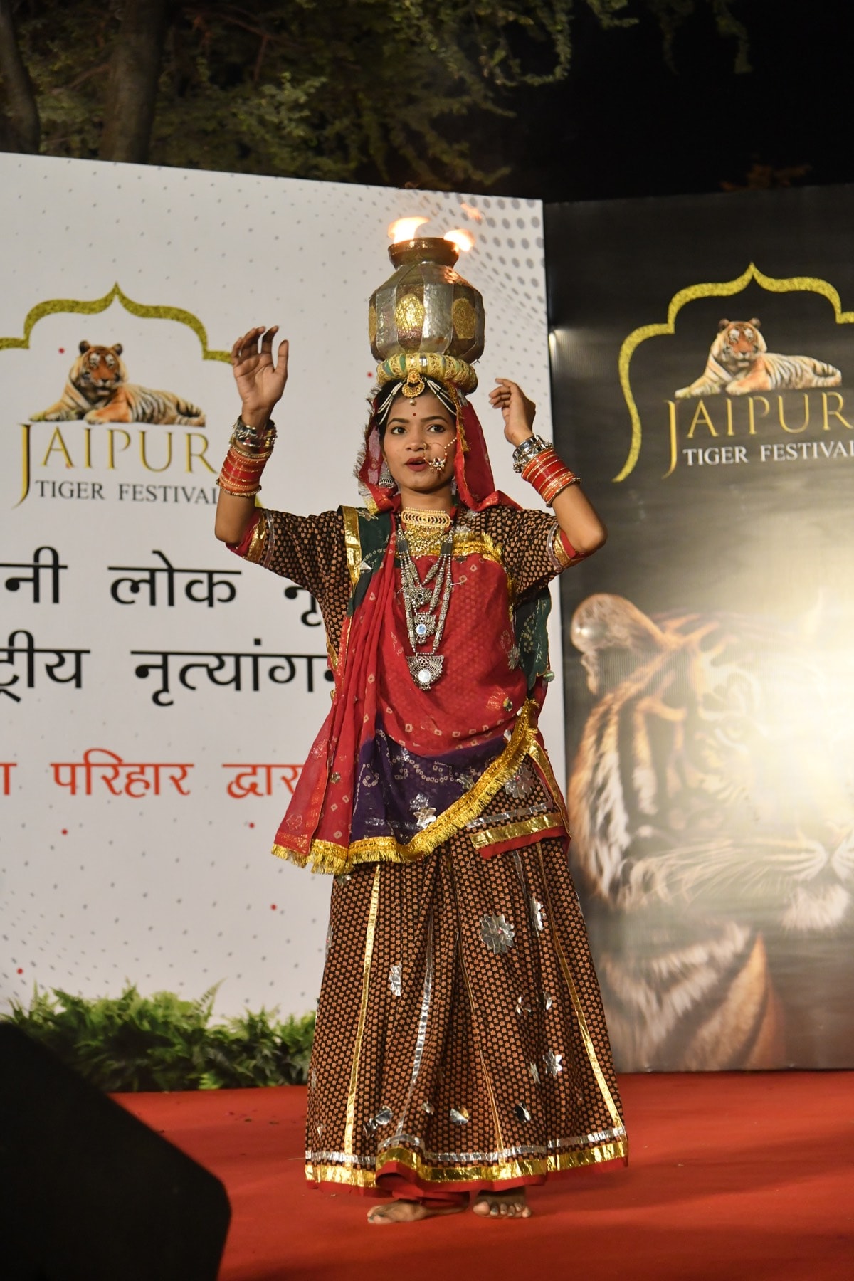 A graceful performance image shaped by poise, costume, and stagecraft.